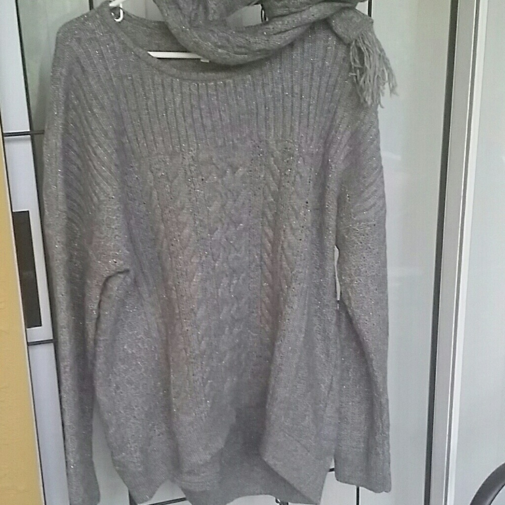 Women gray sweater with scarf.